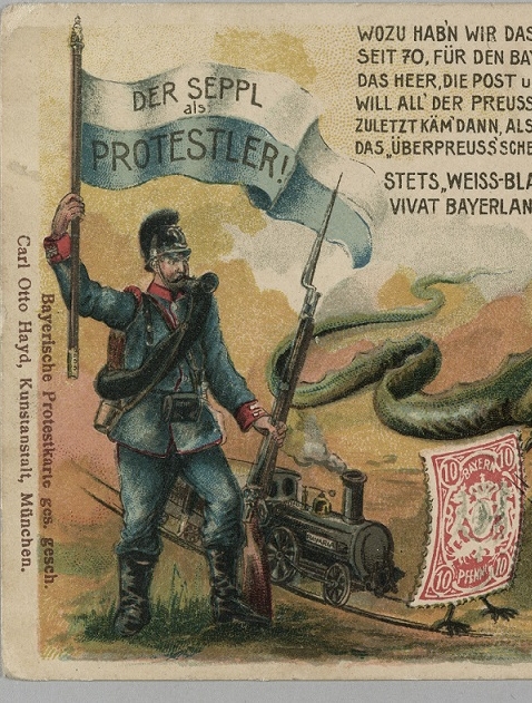 Postkarten-Karikatur zeigt den bayerischen Seppl als Protestler gegen das preußisch geführte Kaiserreich, das dargestellt ist als Drachen mit preußischer Pickelhaube und weit aufgerissenem Maul.